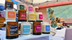 Colorful assortment of candles in jars