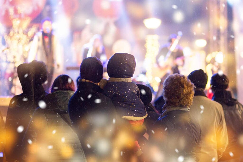 Crowd watching a live performance with at the European Holiday Market.