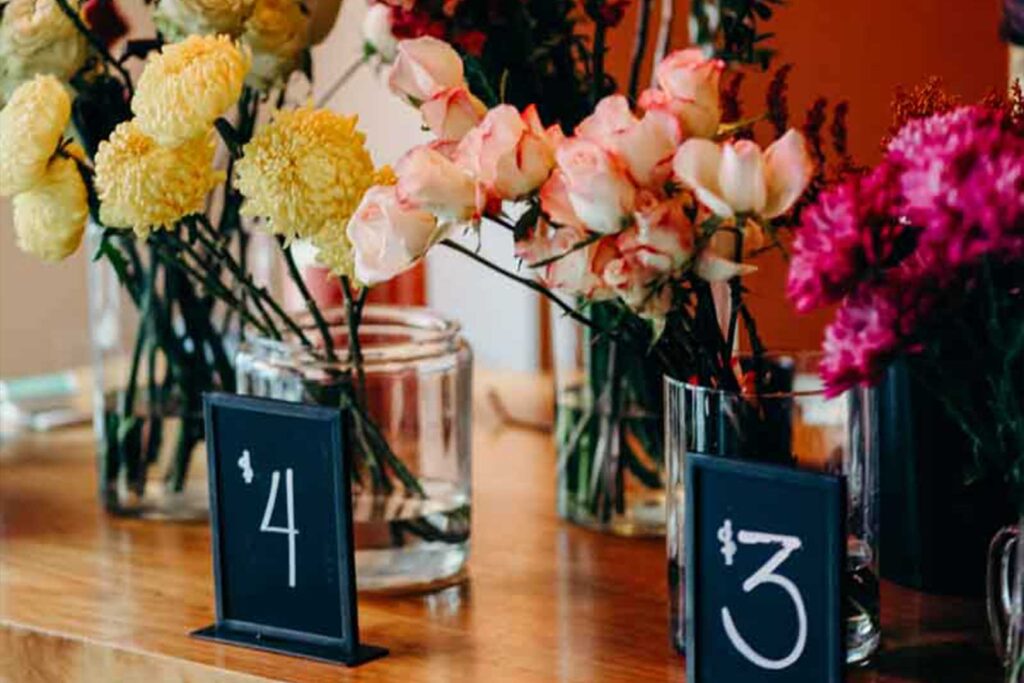 Flowers in vases on table