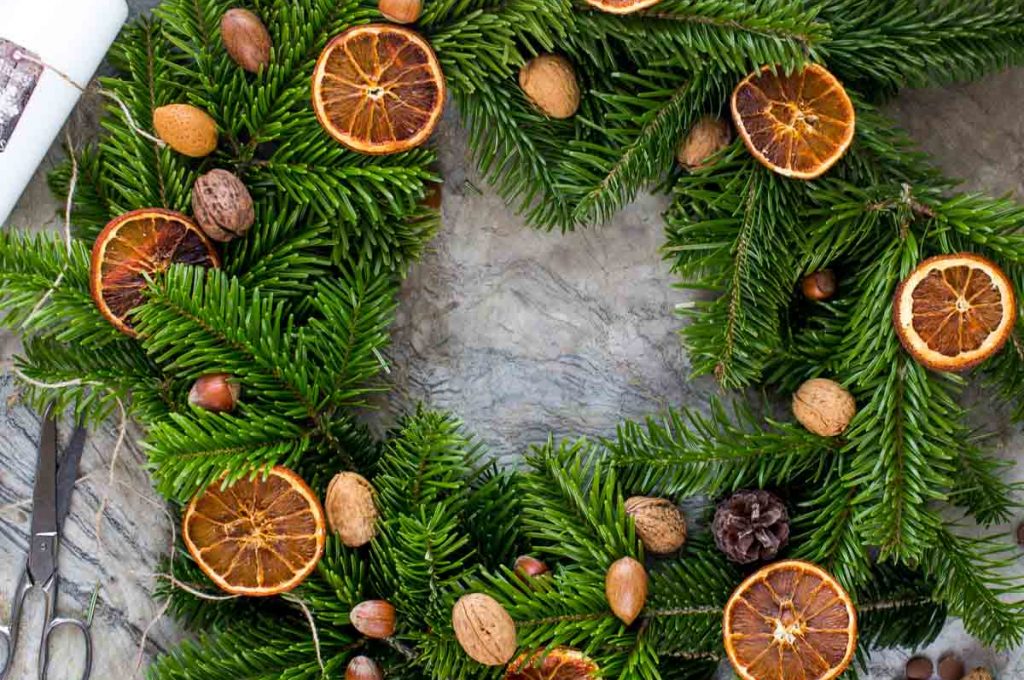 Holiday wreath with dried oranges and cinnamon sticks